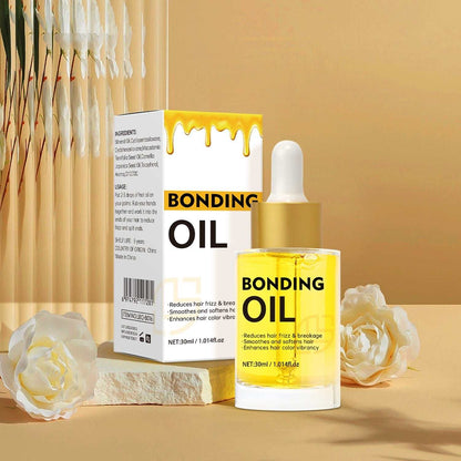 Bouteille d'huile de soin capillaire nourrissante pour cheveux doux et brillants